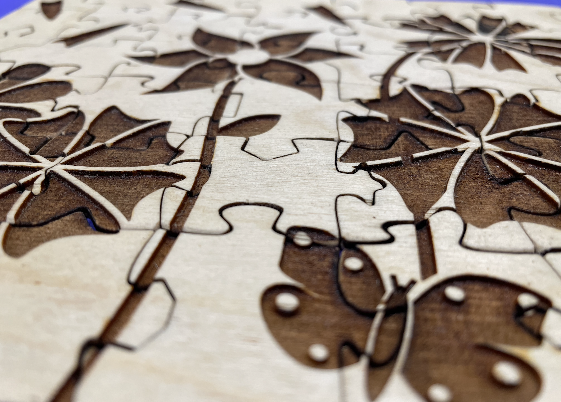 Closeup of the puzzle with all pieces put together. The depth of the etching is very appartent.